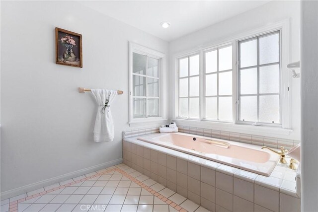 full bathroom with tile patterned floors, recessed lighting, a bath, and baseboards