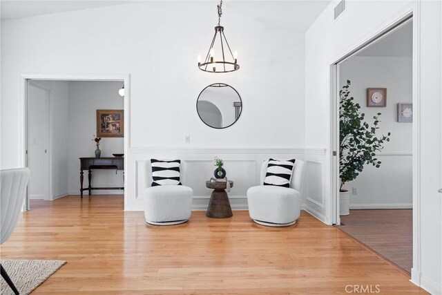 sitting room featuring light hardwood / wood-style flooring