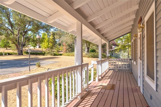 deck featuring covered porch