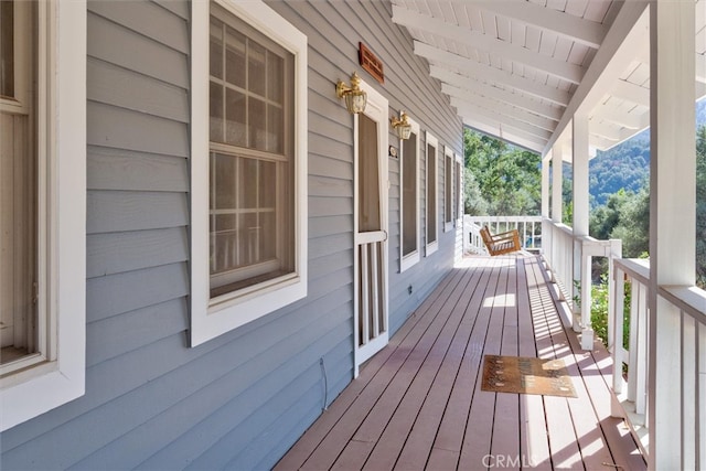 deck with covered porch