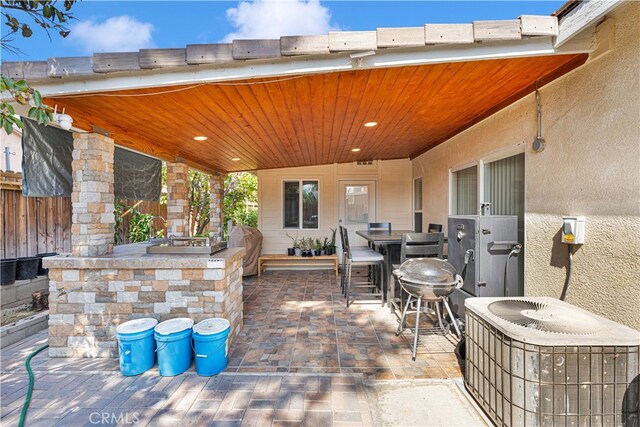 view of patio featuring cooling unit