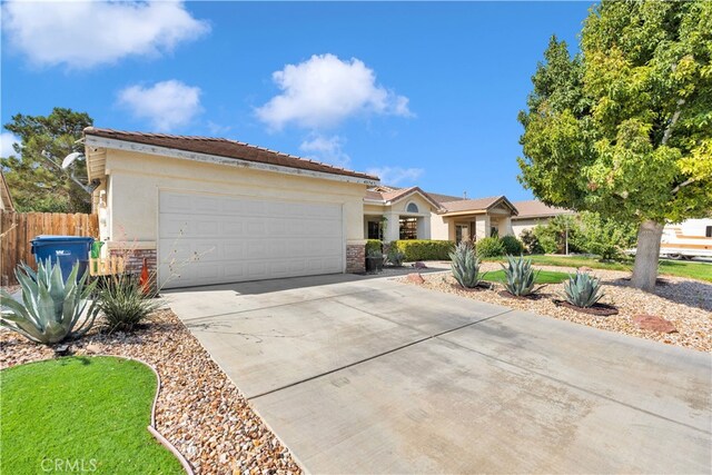 single story home featuring a garage