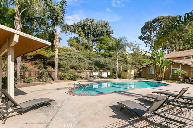 view of pool featuring a patio area