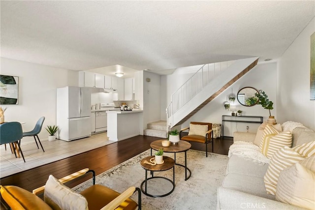 living room with light hardwood / wood-style flooring