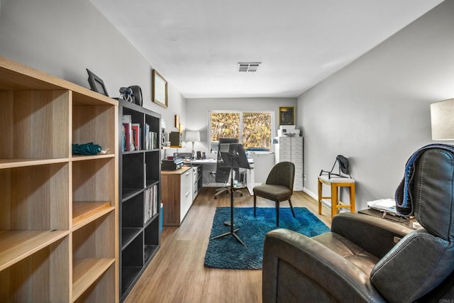 living area with light wood-type flooring