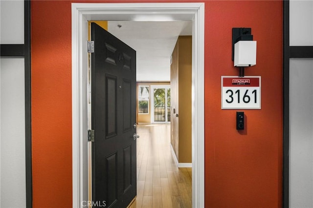 hallway featuring light wood-type flooring