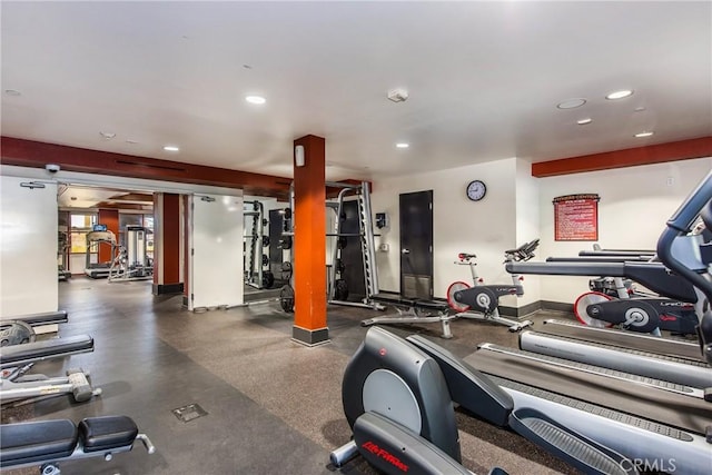 gym featuring recessed lighting