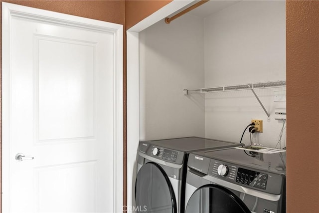 laundry area featuring laundry area and separate washer and dryer