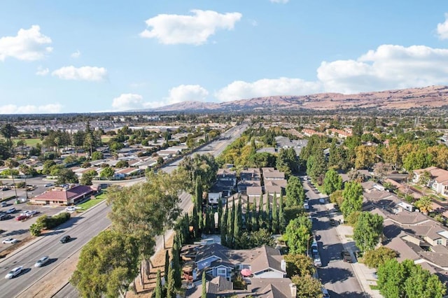 bird's eye view with a mountain view