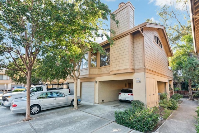 view of home's exterior featuring a garage