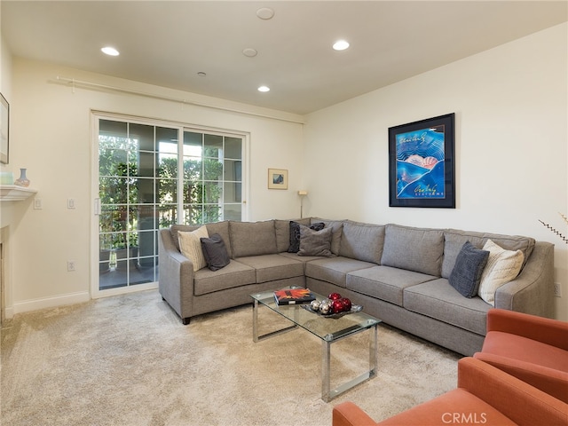 living room featuring light carpet