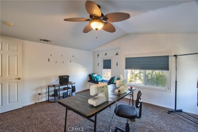 carpeted office with ceiling fan and lofted ceiling