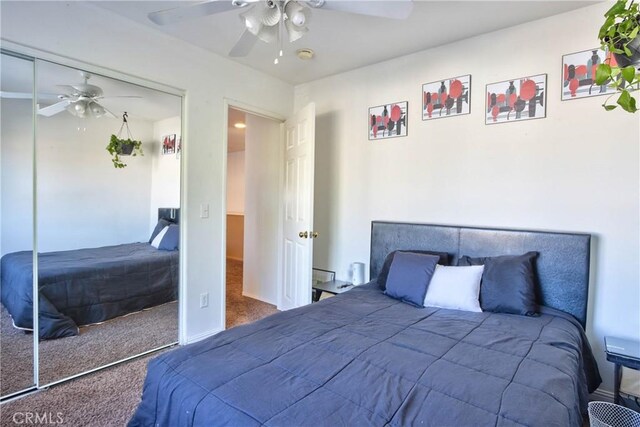 bedroom with carpet flooring, a closet, and ceiling fan