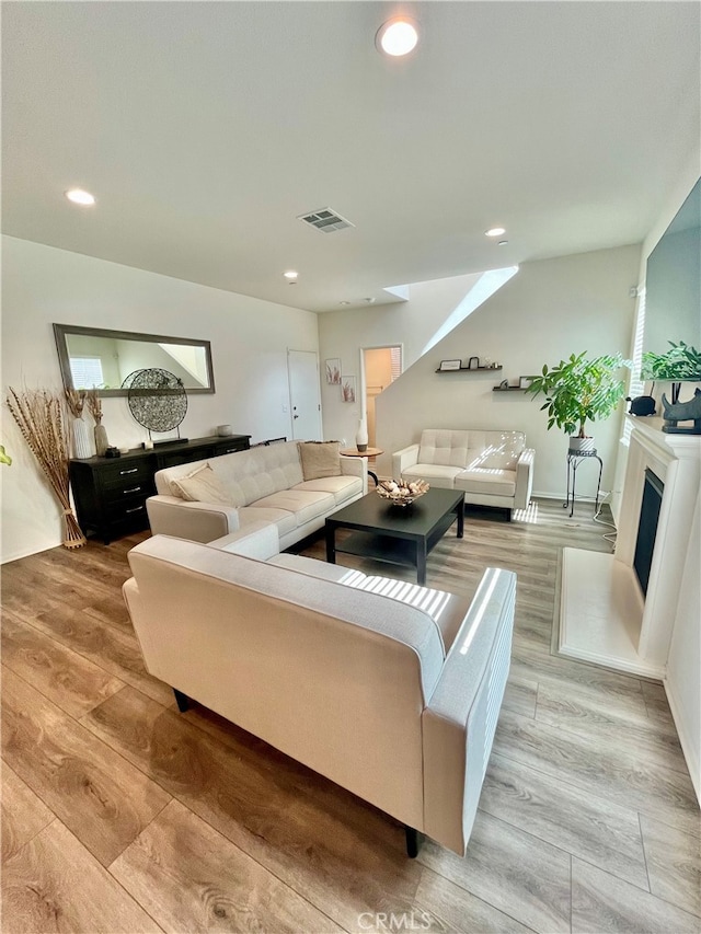 living room featuring light wood-type flooring