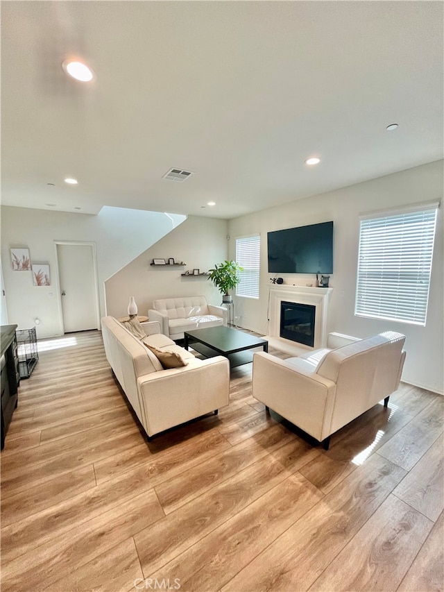 living room featuring light wood-type flooring