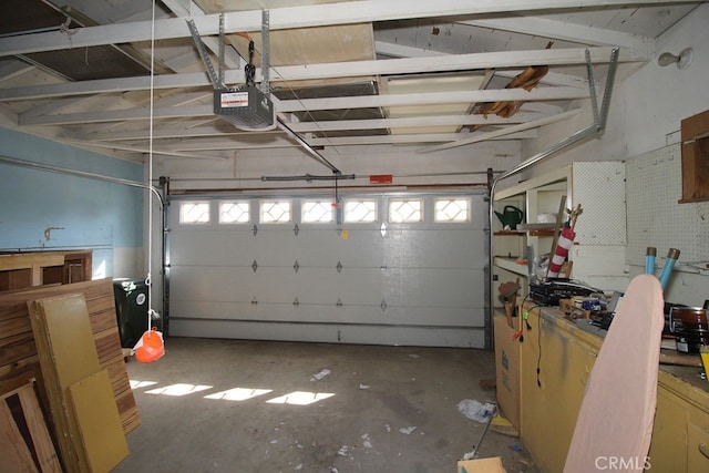 garage featuring a garage door opener