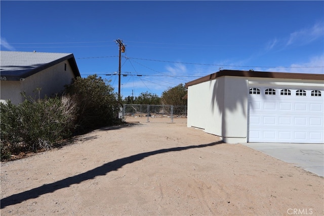 exterior space with a garage