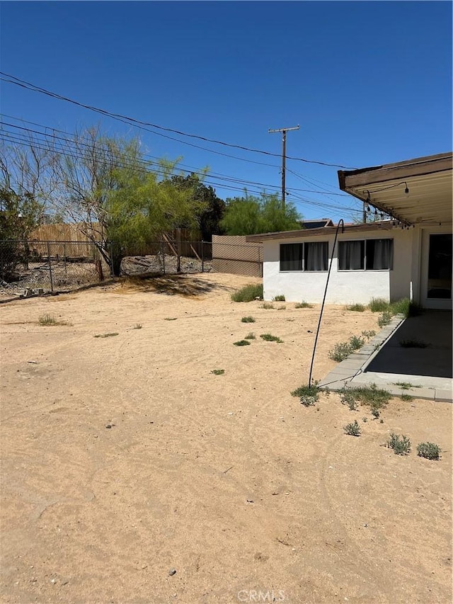6052 Chia Ave Unit 29, Palms, CA 92277 - view of yard with fence