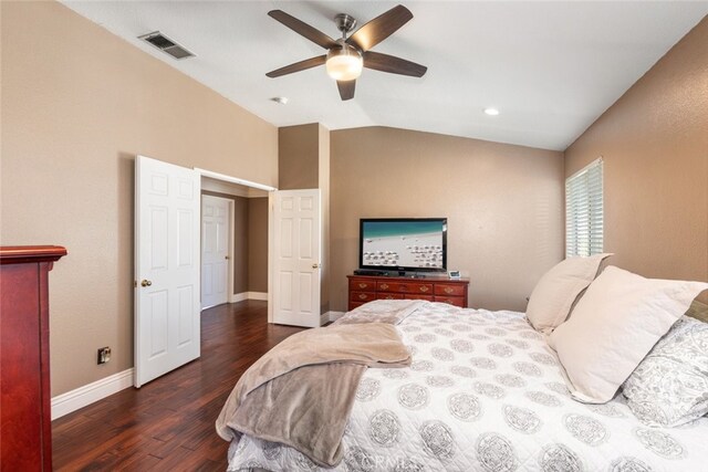 bedroom featuring lofted ceiling, dark hardwood / wood-style floors, and ceiling fan