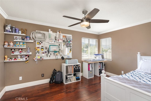 bedroom with ornamental molding, dark wood-type flooring, and ceiling fan