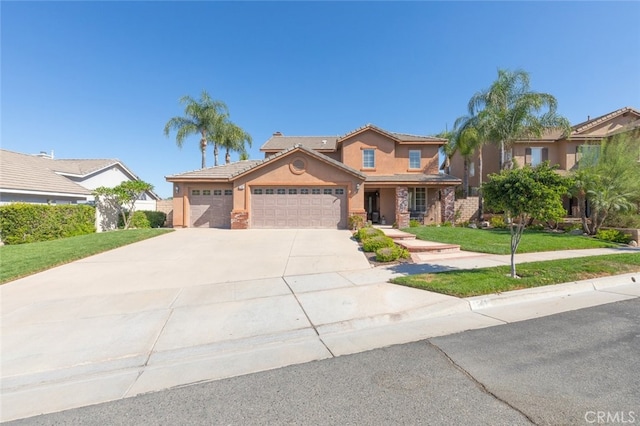 view of front facade featuring a front yard and a garage