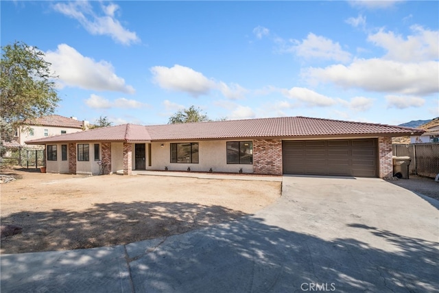 ranch-style home with a garage