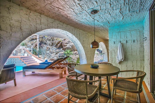 living area with tile patterned flooring