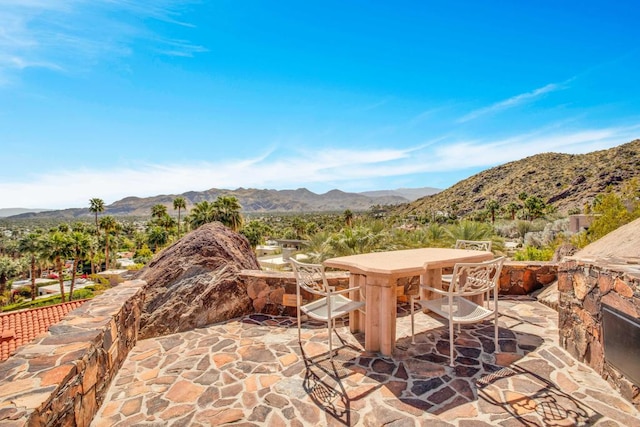 view of patio with a mountain view