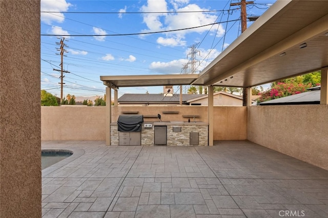 view of patio with grilling area and area for grilling