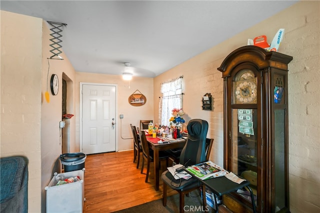 dining room with hardwood / wood-style flooring