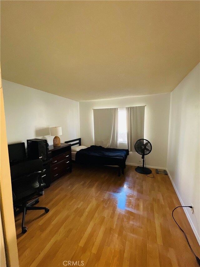 bedroom featuring light hardwood / wood-style flooring