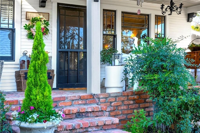 doorway to property with covered porch