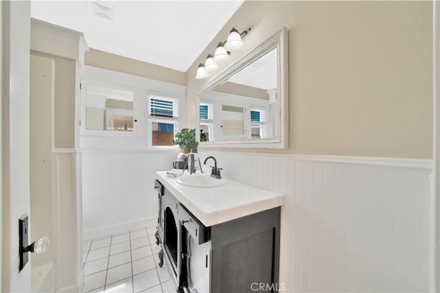 bathroom featuring tile patterned floors and vanity