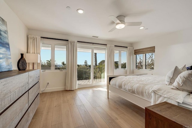 bedroom featuring ceiling fan, access to exterior, and light wood-type flooring