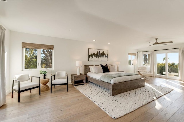 bedroom with ceiling fan, access to outside, and light wood-type flooring