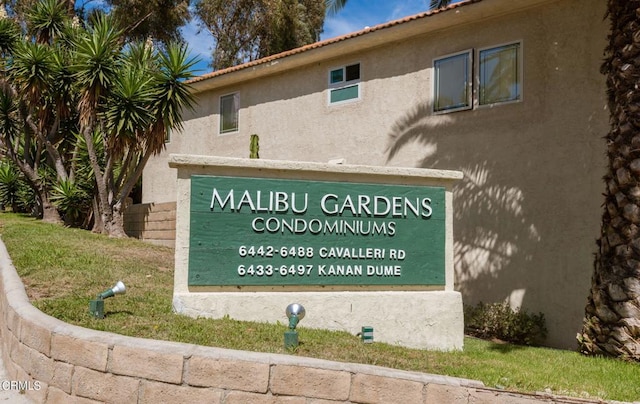 view of community sign