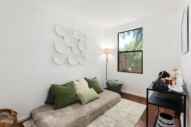 living room with dark hardwood / wood-style floors