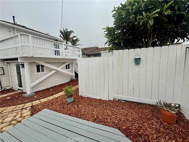 view of yard featuring a wooden deck