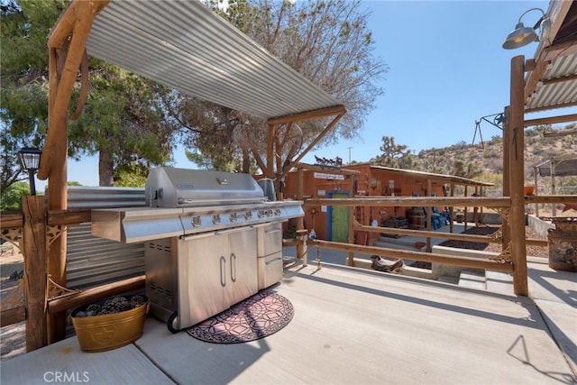 view of patio with a grill