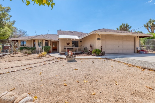 single story home with a garage