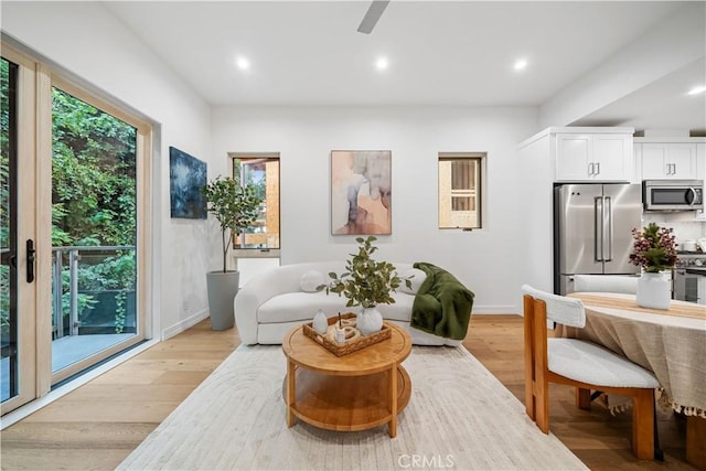 living room with light hardwood / wood-style floors