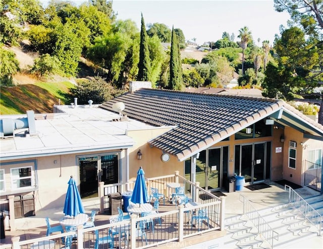 back of property with a patio area