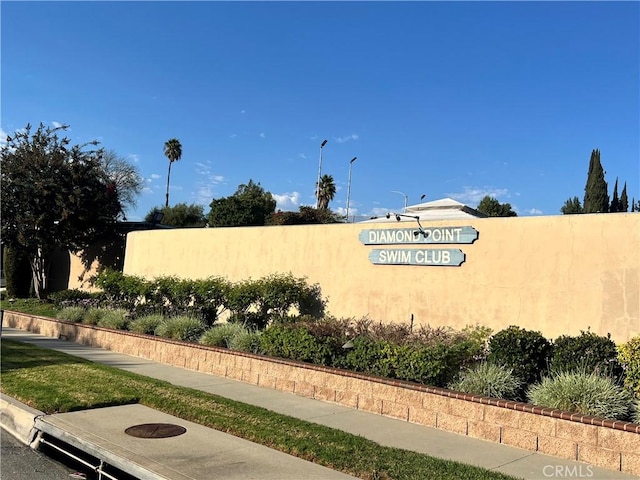 view of community sign