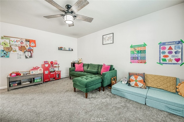 carpeted living room with ceiling fan