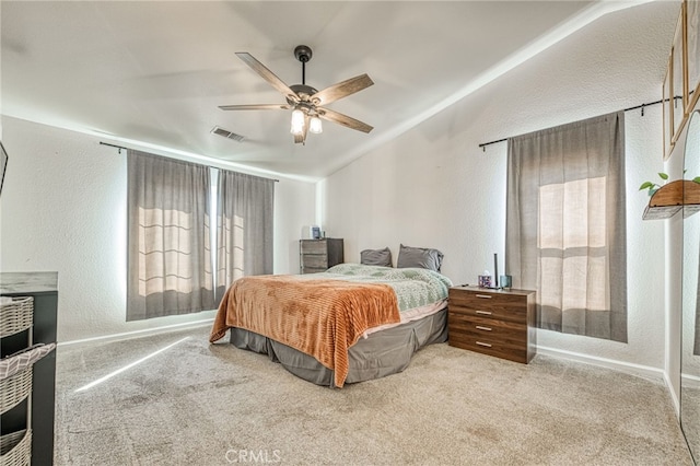 bedroom with carpet floors, ceiling fan, and lofted ceiling