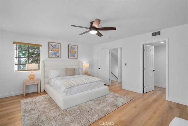 bedroom featuring ceiling fan and light wood-type flooring