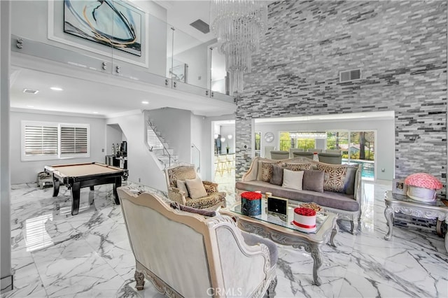 living room featuring pool table and a high ceiling