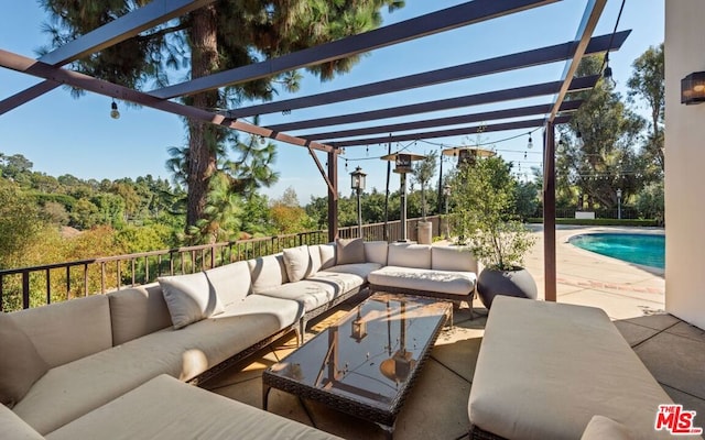 view of patio / terrace featuring an outdoor living space, a pergola, and a fenced in pool