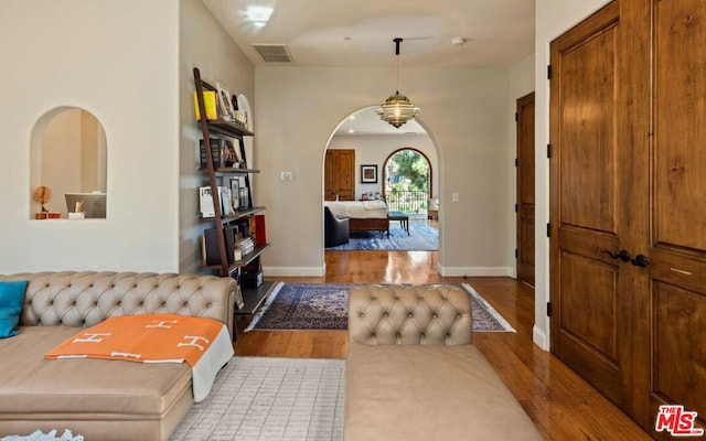 foyer entrance with light hardwood / wood-style floors