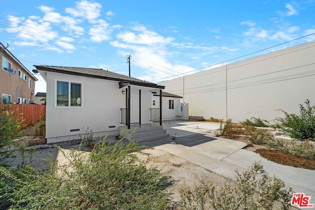 view of front of home featuring a patio area